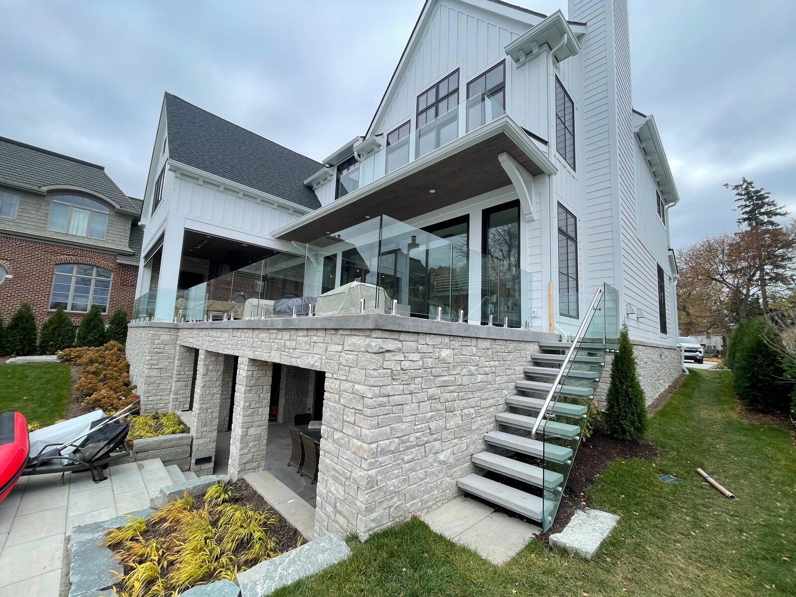 Exterior glass deck railing on a luxury home