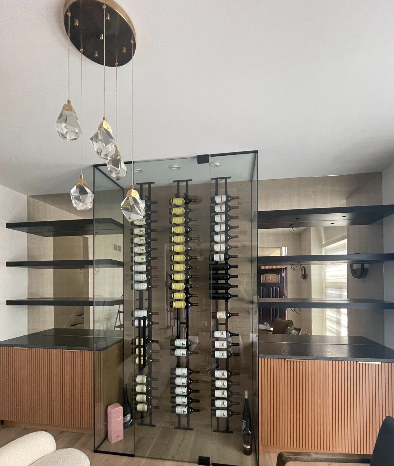 Glass-enclosed wine cellar display