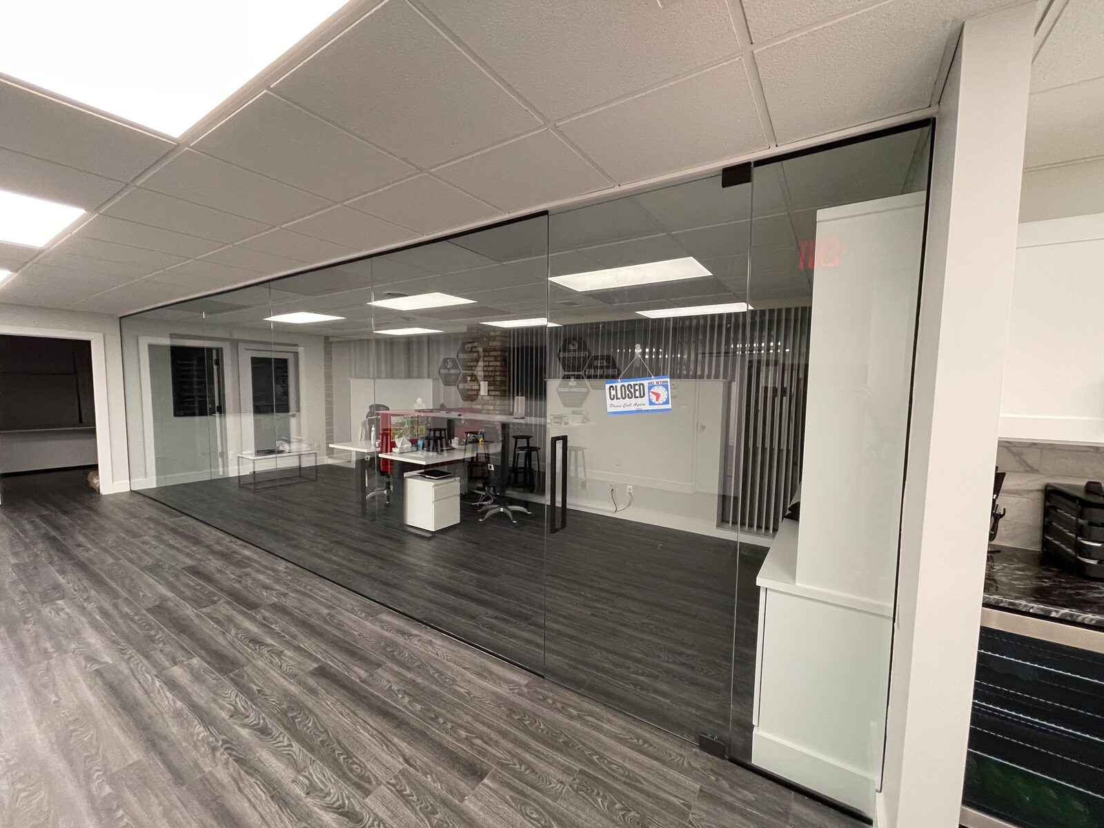 Glass office partitions in a commercial suite