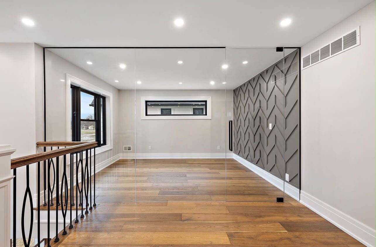 Glass partition wall with chevron accent