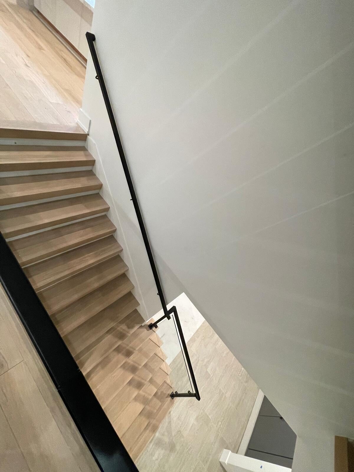 Glass railing stairwell seen from above