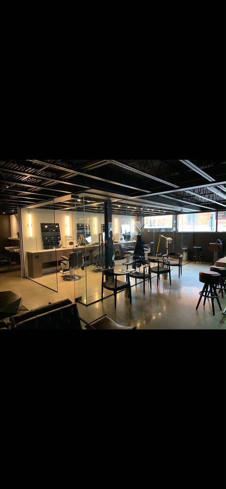 Glass partition walls in a salon suite