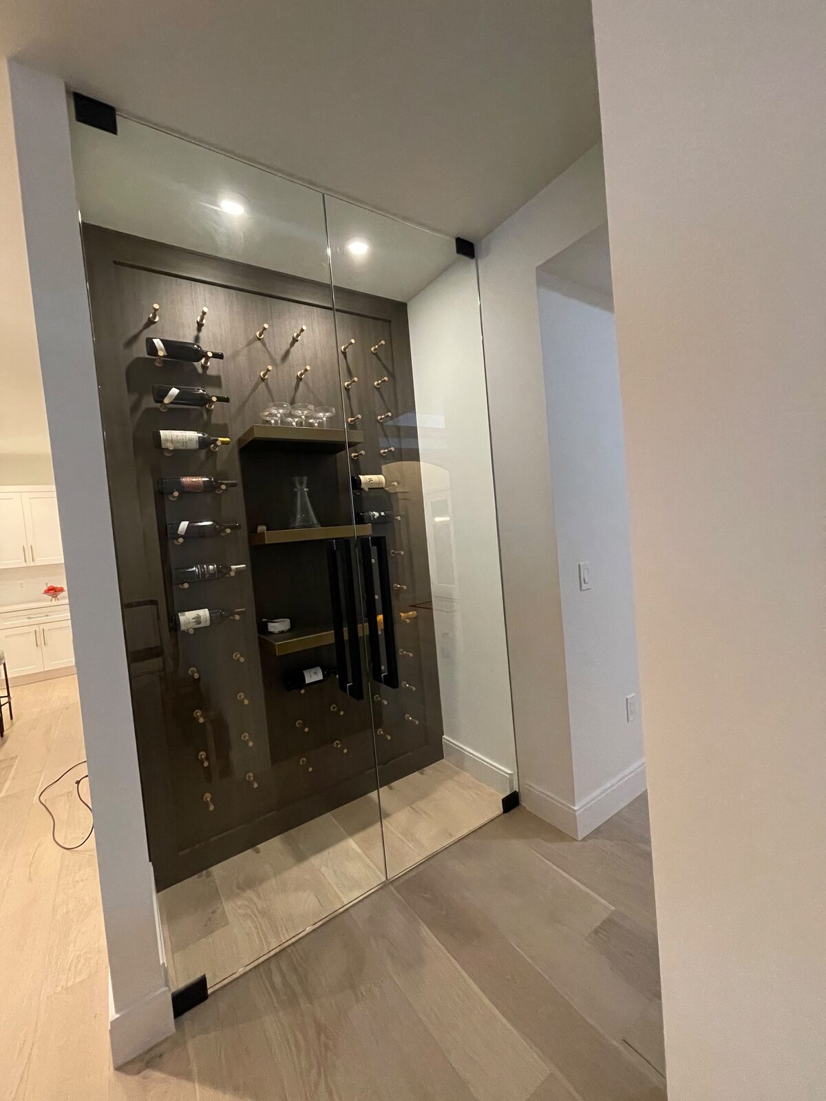 Floor-to-ceiling glass wine room